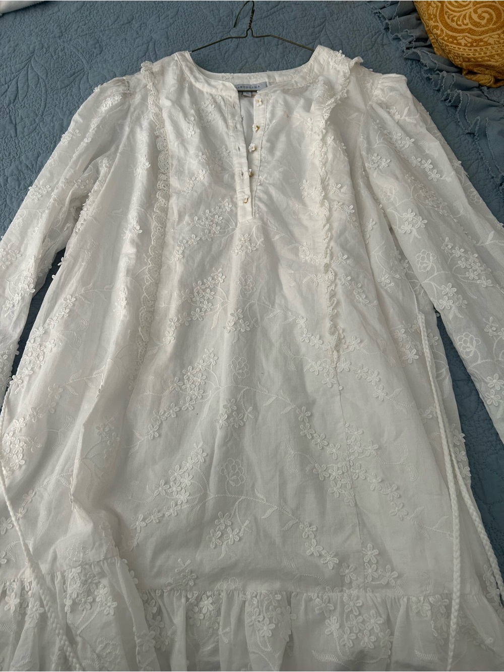 White Embroidered Mini Dress - Elegant Floral Detail pay attention to details.